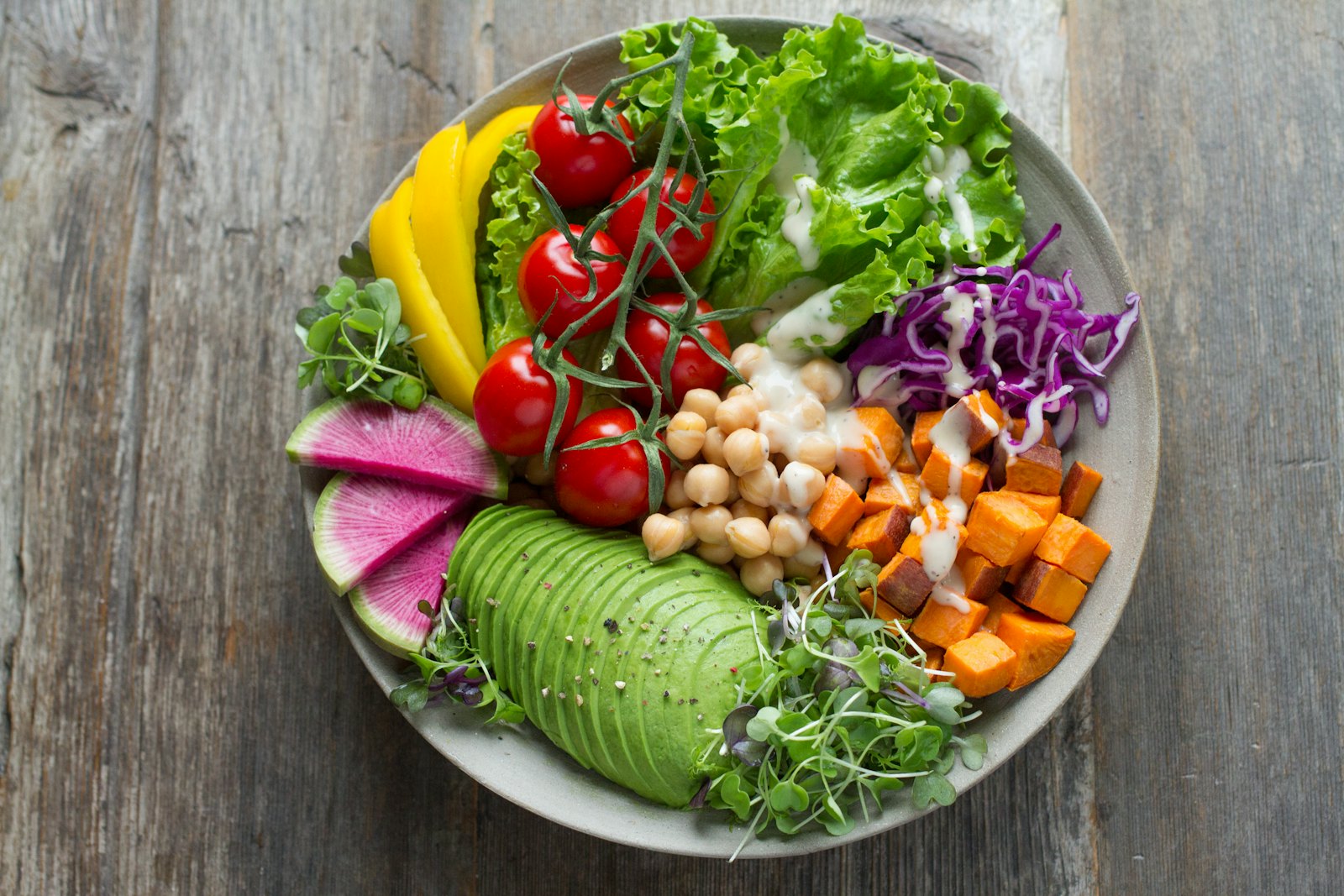 Roasted vegetable bowl with avocado and chickpeas